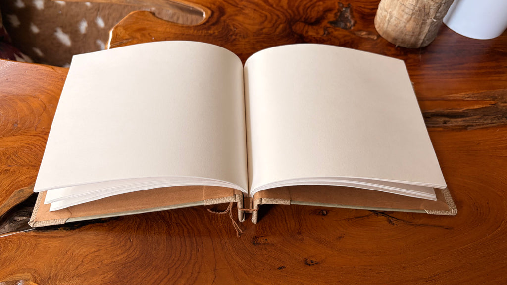 Open notebook on a wooden surface